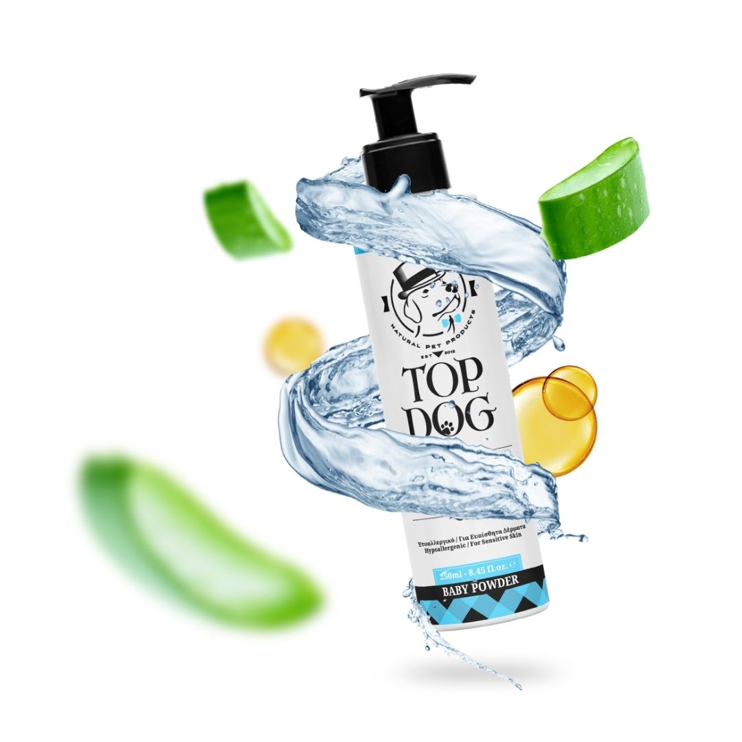 Top Dog Baby Powder Pet Shampoo bottle surrounded by natural ingredient elements of aloe vera, water and olive oil. 